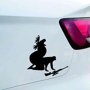 Xalvoria black hunting deer and rifle silhouette decal displayed on a car rear panel near the tail light, showing outdoor hunting style vehicle decoration in a real-world scene.
