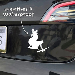 Xalvoria white hunting deer silhouette vinyl sticker with rifle applied on a car bumper, highlighting weatherproof and waterproof durability for outdoor vehicle use.