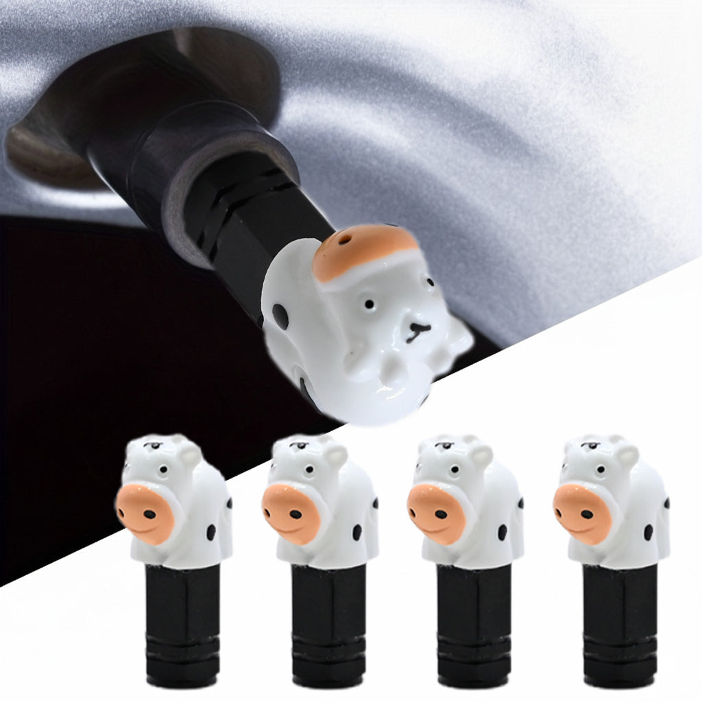 Cute cow valve stem caps in a 4-pack, featuring a white Resin animal design installed on a car tire valve for decorative use.