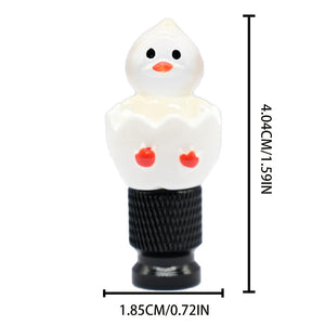 Cute hatching chick valve stem cap with size measurements shown, white resin topper on black metal base.