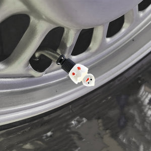 Hatching duck valve stem cap installed on a car tire valve – Xalvoria