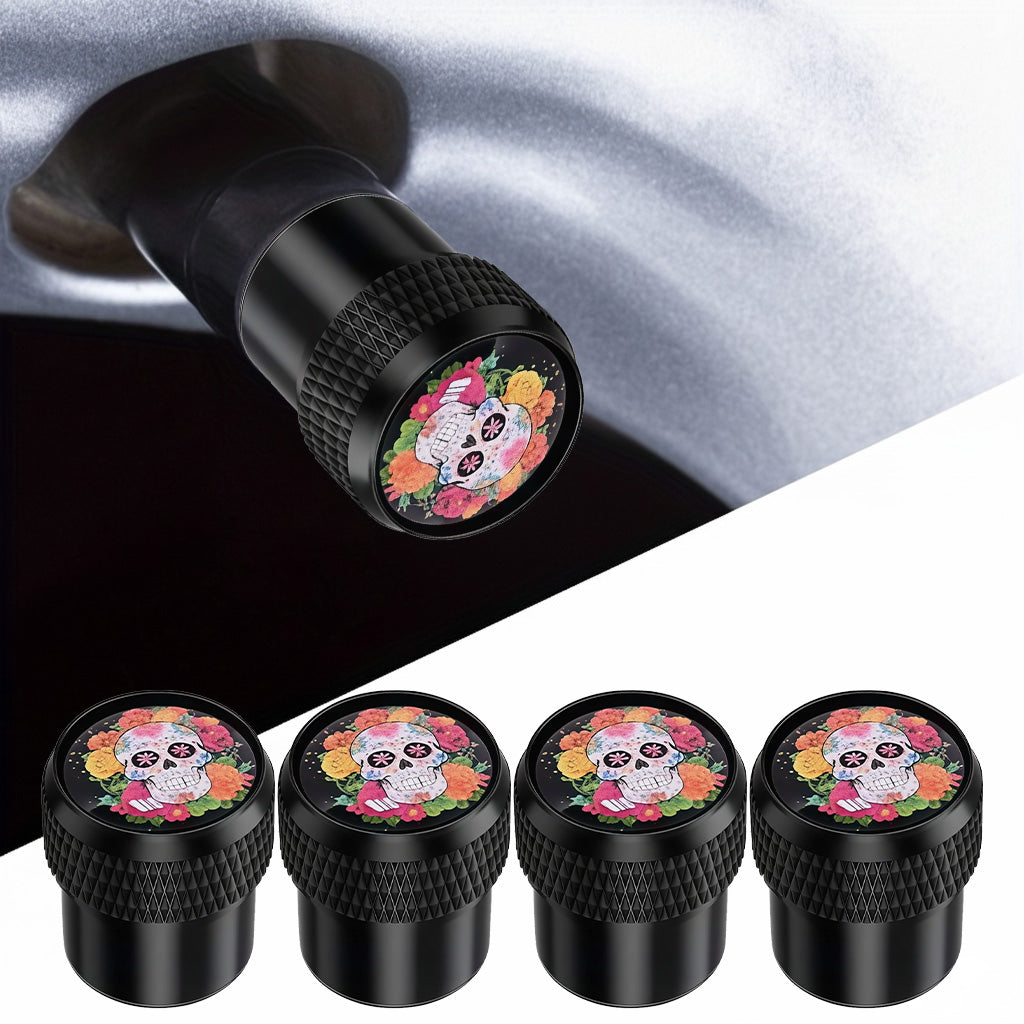 Set of four black metal valve stem caps with colorful sugar skull and floral design, decorative and durable for cars, trucks, and SUVs by Xalvoria.