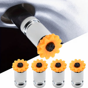 Sunflower valve stem caps 4-pack with car tire installation close-up – Xalvoria