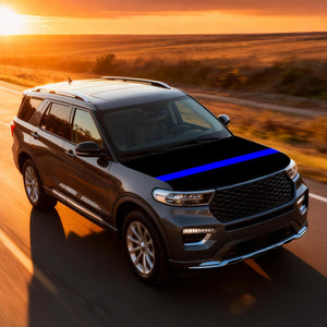 SUV fitted with Thin Blue Line hood cover driving on open highway, featuring iconic blue stripe design.