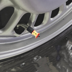 Xalvoria Apple Core valve stem cap installed on angled rim surface in close-up view