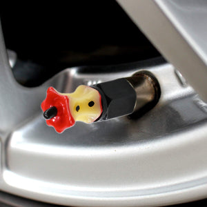 Xalvoria Apple Core valve stem cap installed on silver car wheel close-up