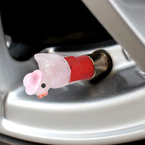 Xalvoria Pink Hat Duck valve stem cap installed on car wheel side view