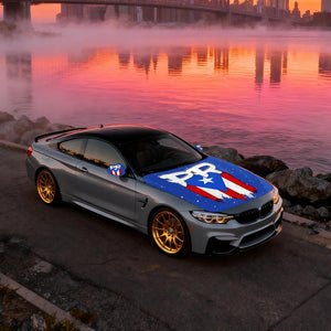 Xalvoria Puerto Rico PR flag car hood cover displayed on sports coupe with bold PR flag artwork across hood and mirrors.