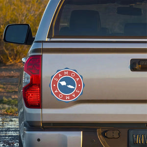 Xalvoria Samoa round emblem decal on silver pickup truck tailgate