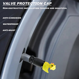 Yellow duck valve stem cap installed on a wheel, showing waterproof and anti-corrosion protection features.