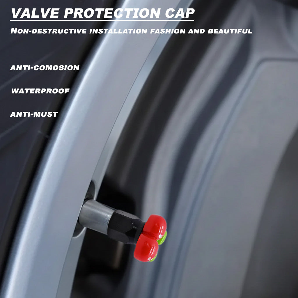 Cherry-shaped valve stem cap installed on a car wheel, highlighting waterproof and anti-corrosion protection features.