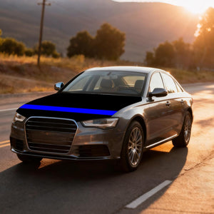 Thin Blue Line car hood cover displayed on a sedan during sunset drive, showcasing sleek black design with blue stripe