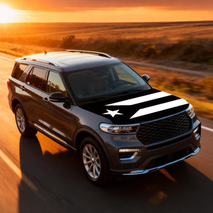 Xalvoria black and white Puerto Rico flag car hood cover installed on SUV driving on road at sunset