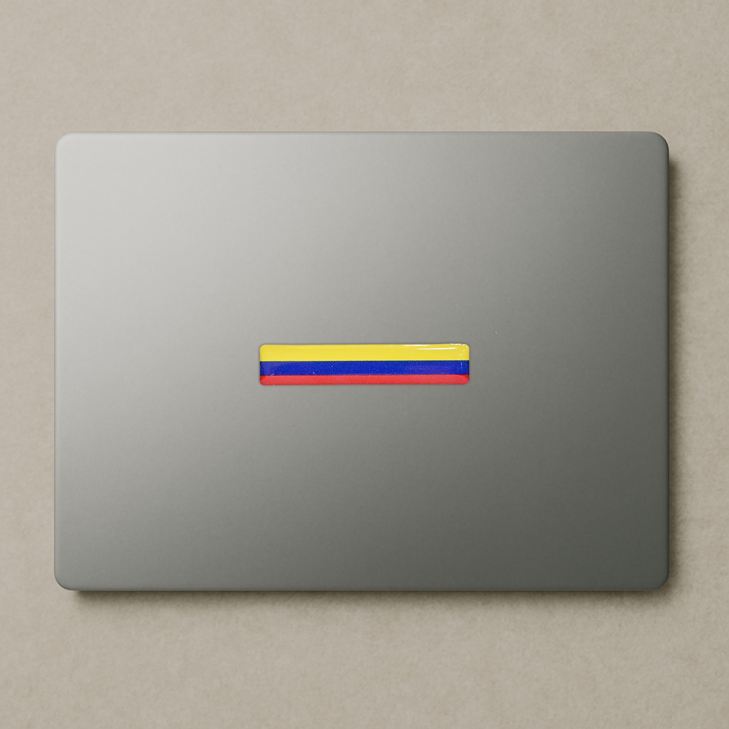 Xalvoria Colombian flag strip decal used as a minimalist laptop decoration for a clean patriotic look.