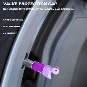 Xalvoria lavender duck valve stem cap shown installed on a vehicle wheel in a close-up scene.