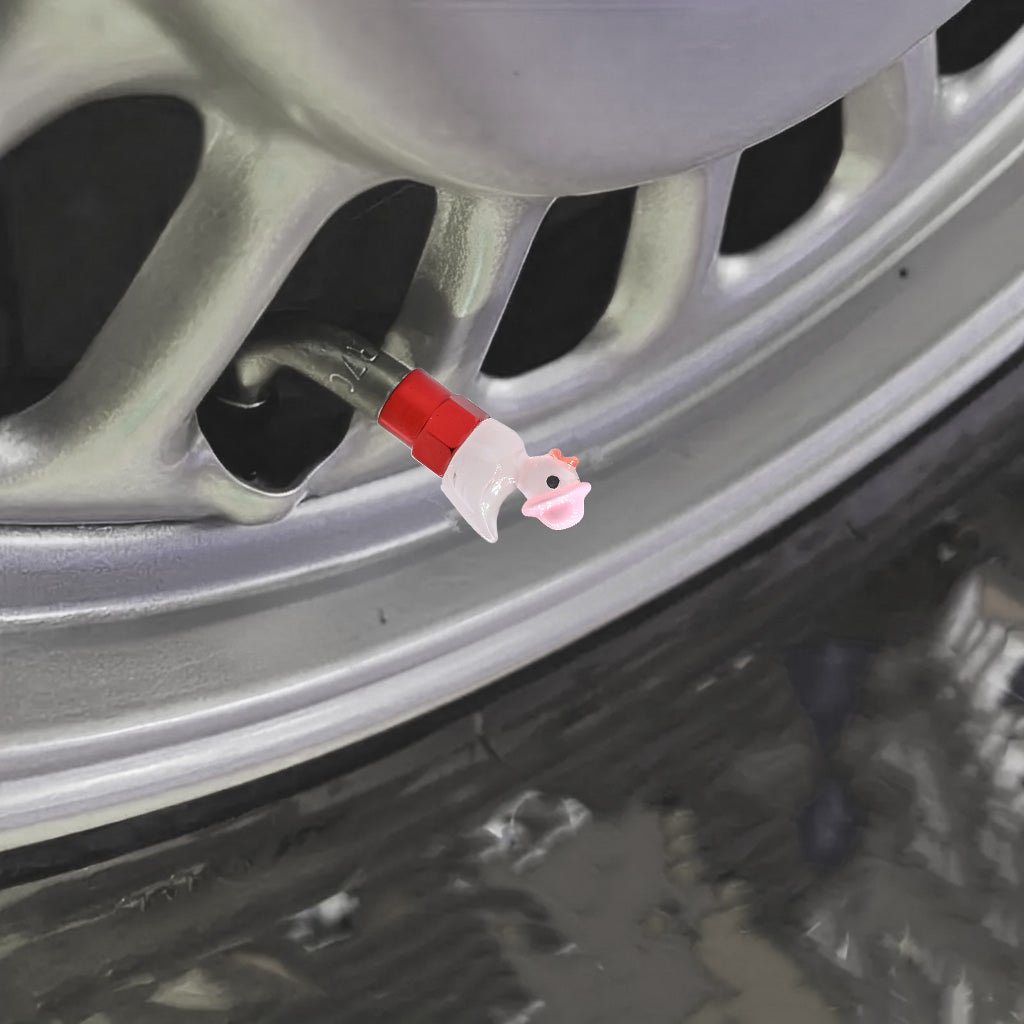 Xalvoria Pink Hat Duck valve stem cap installed on car wheel angle view