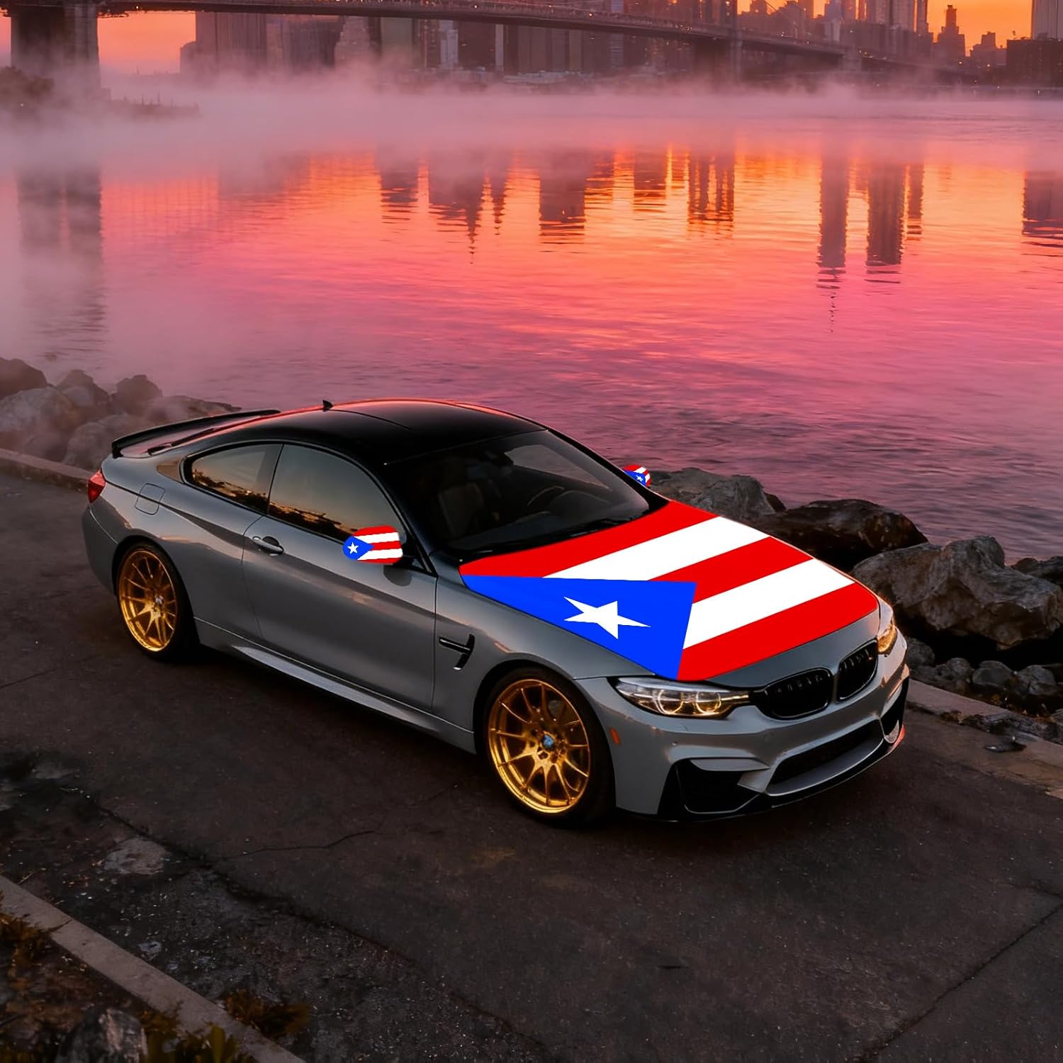 Xalvoria Puerto Rico flag car hood cover shown on a sports car by the ocean at sunset.
