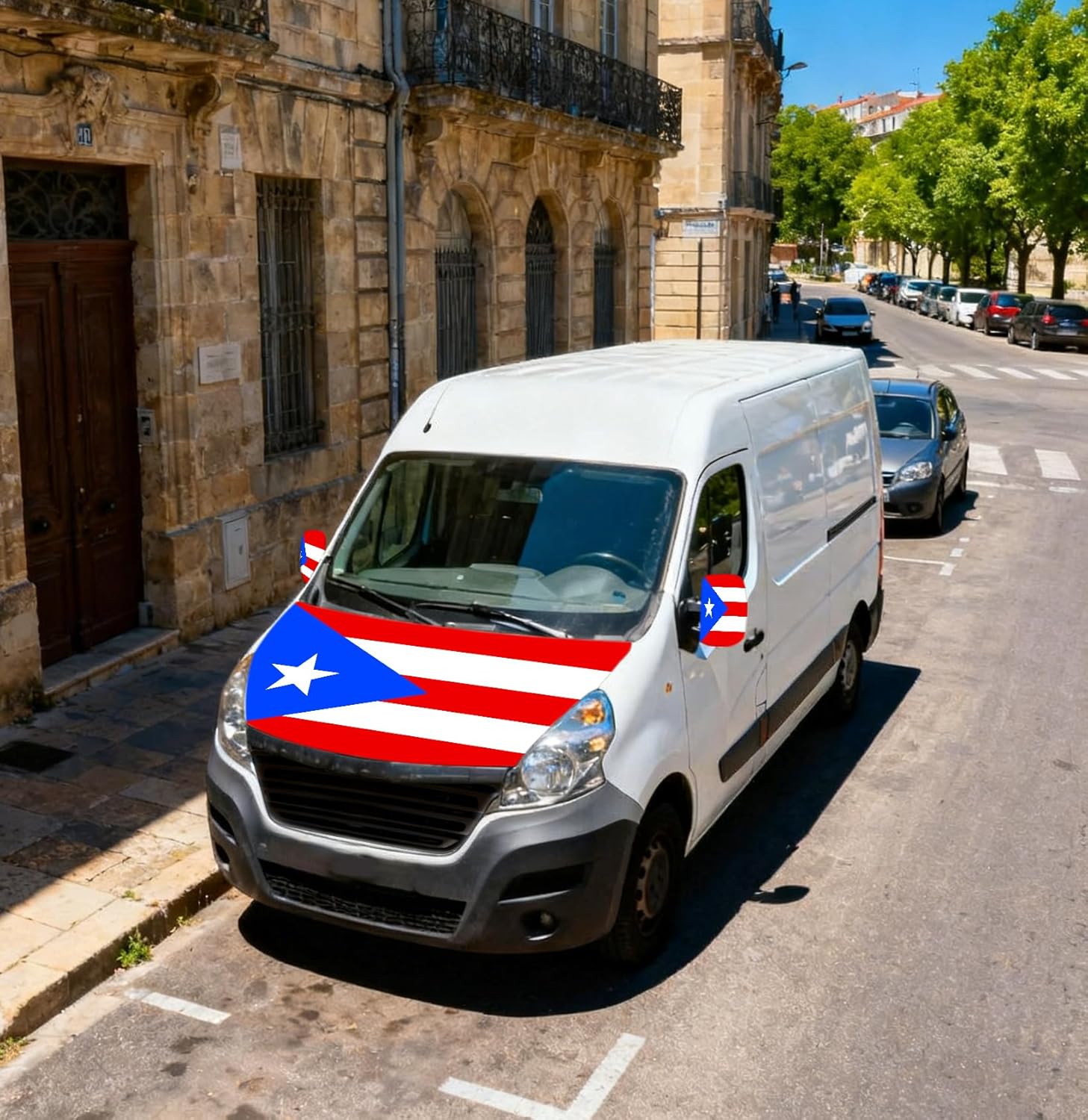 Xalvoria Puerto Rico flag car hood cover installed on a white van parked on a city street.