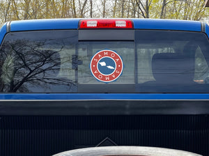 Xalvoria Samoa round decal displayed on blue truck rear window
